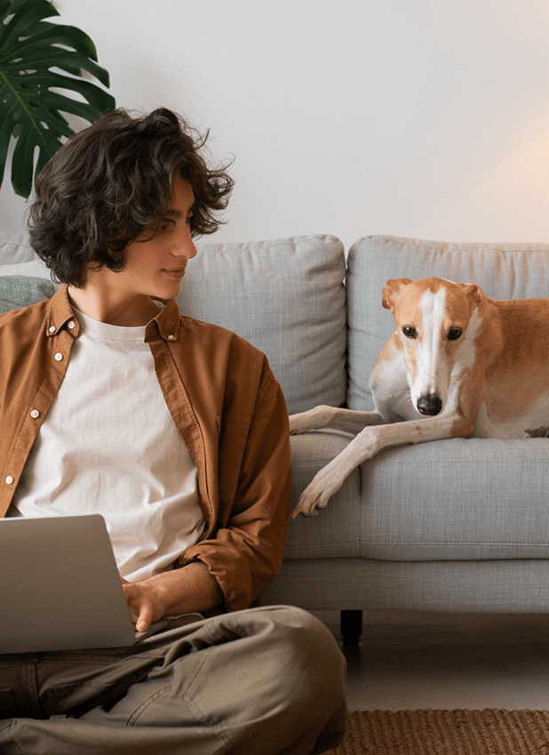 Independent doer working from home with a dog