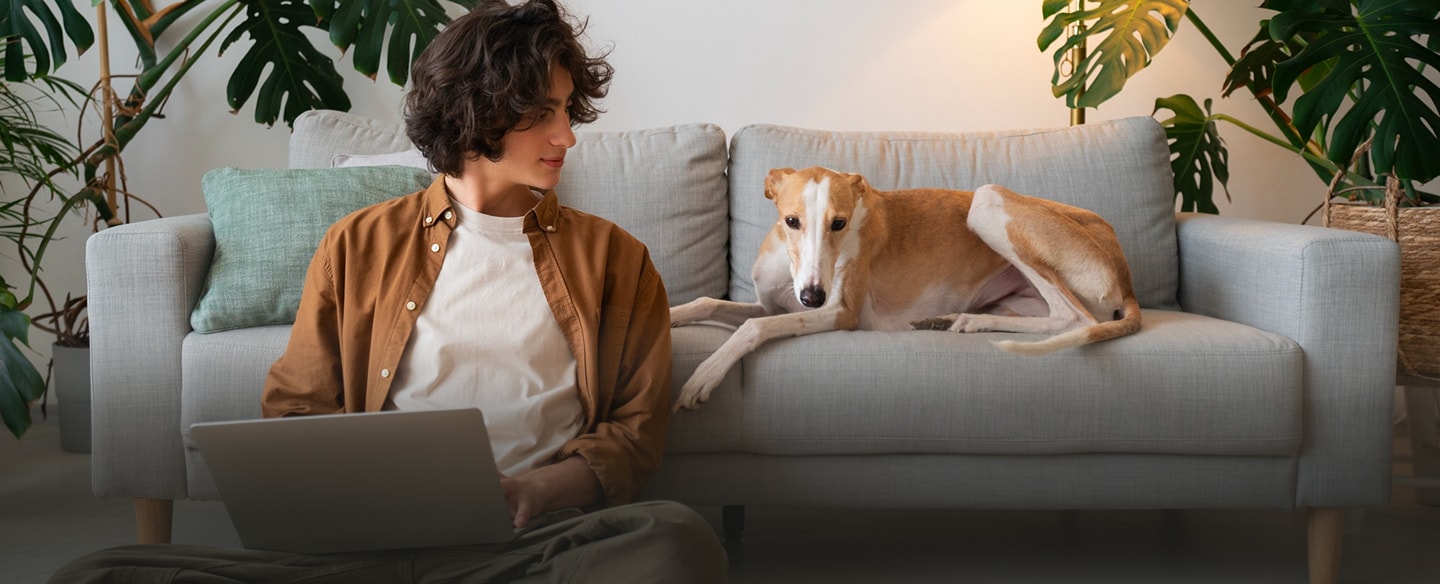 Independent doer working from home with a dog