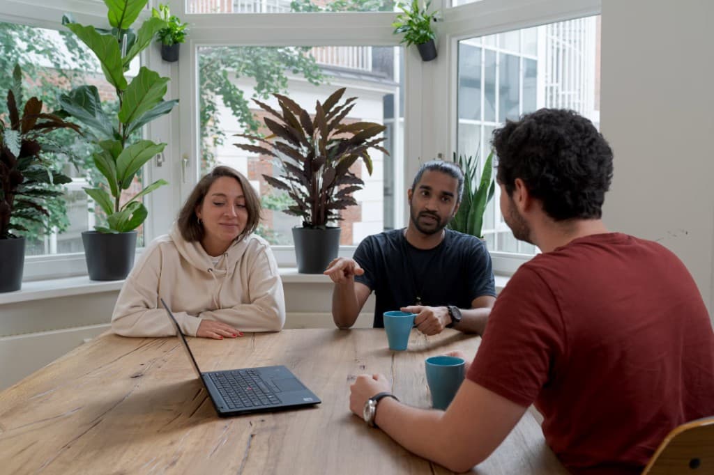 Team collaborating around a table